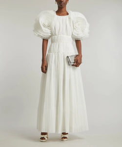 Indulge in raw, untamed beauty with Aje's Expressive Pleated Maxi-Dress. With a pleated fitted-bodice, short-sleeves adorned with voluminous organza ruffles, and an effortlessly relaxed maxi-skirt, this statement piece exudes elegance and sophistication. Embrace the brand's dedication to bold, unconventional style.