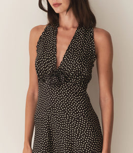 The Mazarin Dress - Camille Dot by Doen captures subtle 1990s sophistication through its luxurious silk-viscose blend and elegant halter neckline accented with fine ruffles. Designed with a fitted bodice and an invisible side zipper, it ensures a smooth, tailored silhouette. A removable silk georgette rosette brooch adds an element of adaptable refinement, perfect for elevating your wardrobe with timeless grace.