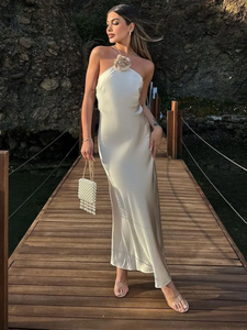 Get ready to turn heads at your next event with the Riva Dress. Made from luxurious cocktail satin silk, this elegant dress exudes sophistication and style. Perfect for any occasion, it will make you feel confident and glamorous. Elevate your wardrobe with this must-have piece.