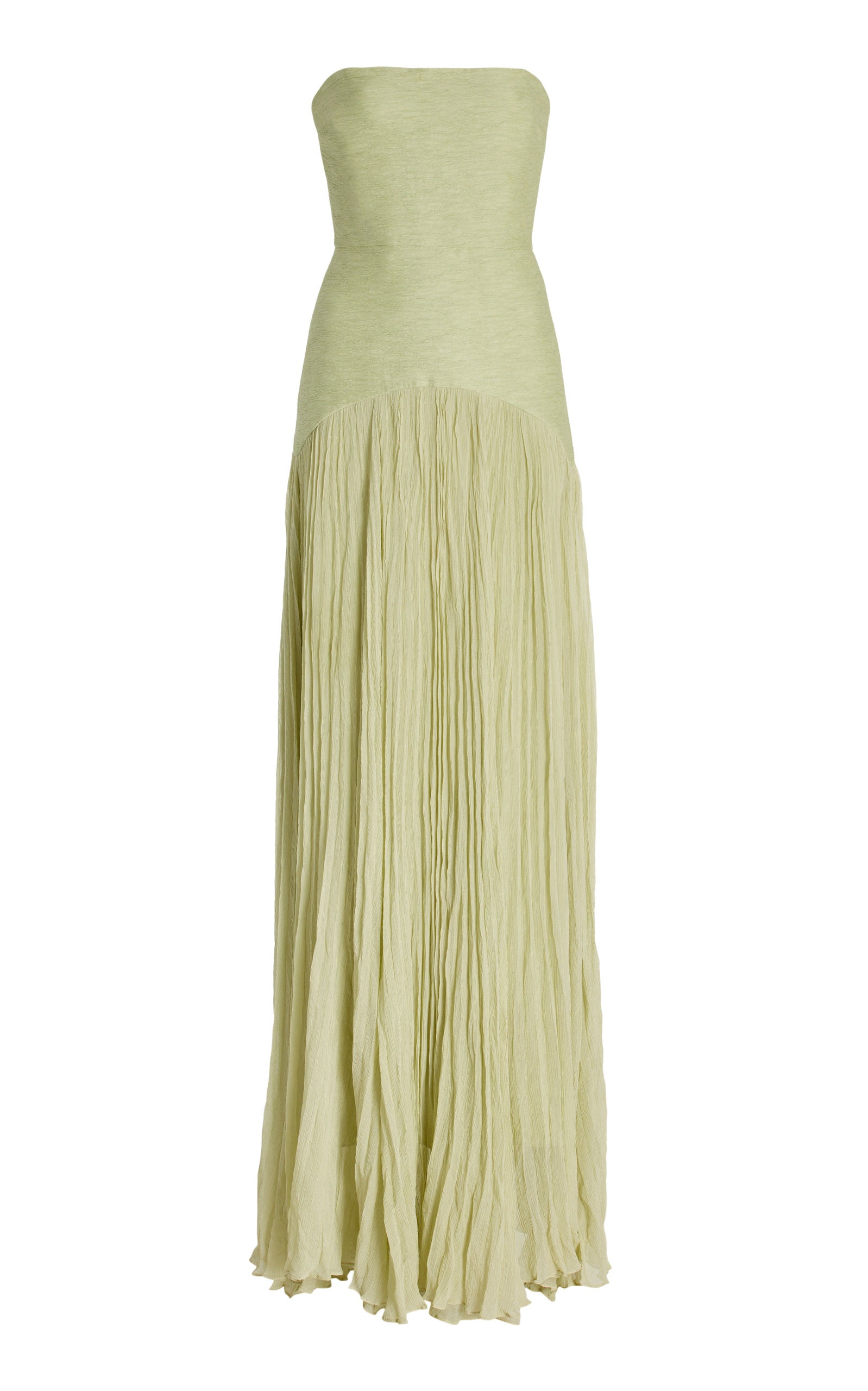 The Sunniva Plisse Strapless Gown showcases a fitted strapless bodice with a gracefully curved dropped waist, leading into a flowing plisse skirt that moves elegantly with every step. Its timeless silhouette emphasizes a refined, feminine shape, perfect for occasions that call for understated sophistication. Pair with statement earrings to elevate the look, capturing the essence of modern elegance.