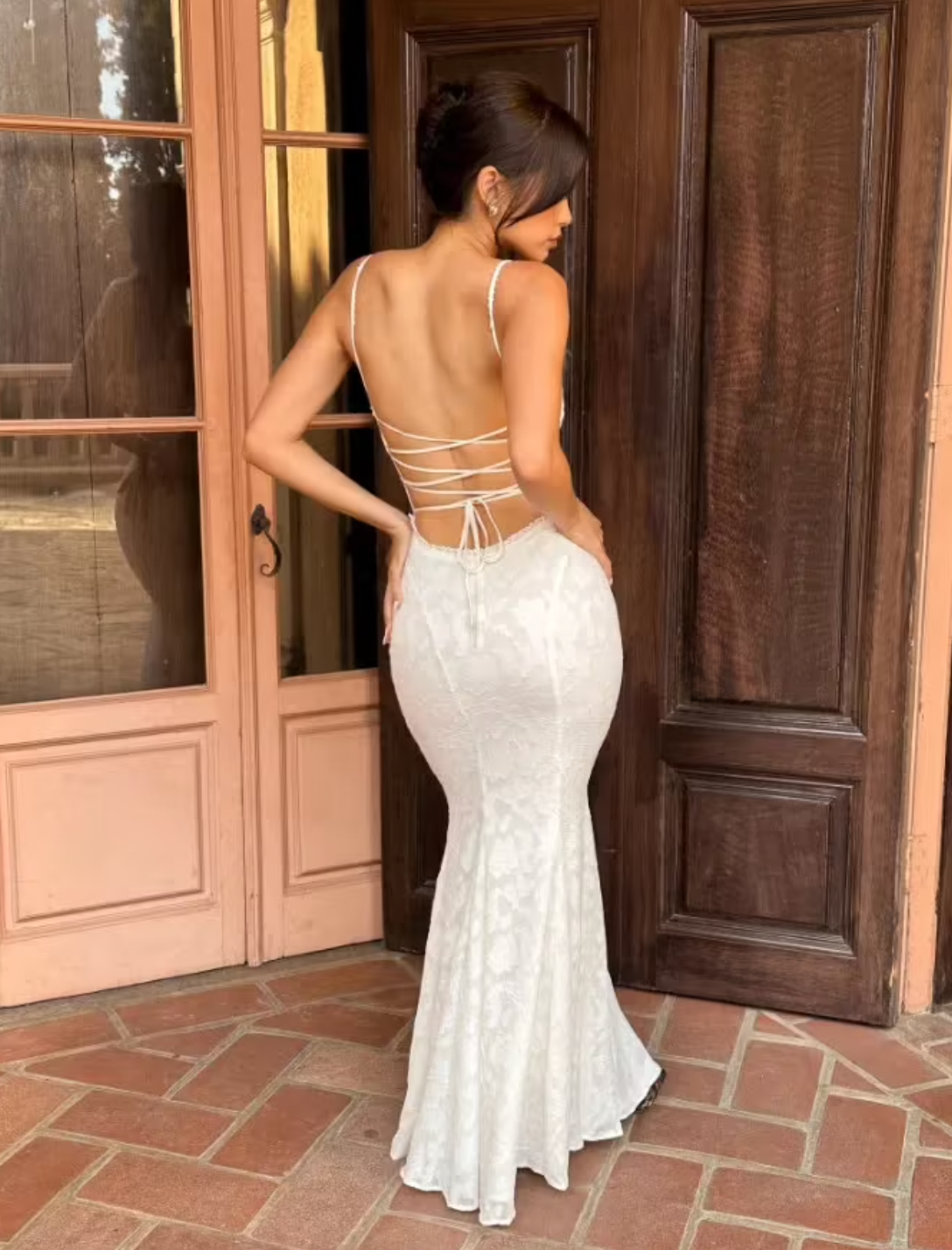 Experience elegance and allure with the expertly-crafted Abella Dress. Its stunning fishtail silhouette, intricate backless detail, and beautiful white lace make it perfect for any bride wanting to make a statement on her special day. Turn heads and feel confident in this timeless and elegant dress.