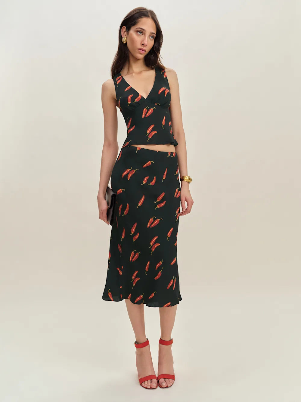 The Ryan Two Piece features a sophisticated v-neck design with a fully lined construction for a polished look. Crafted from lightweight, drapey crepe fabric, it offers a refined dry hand feel that enhances comfort and movement, making it ideal for stylish, effortless wear.