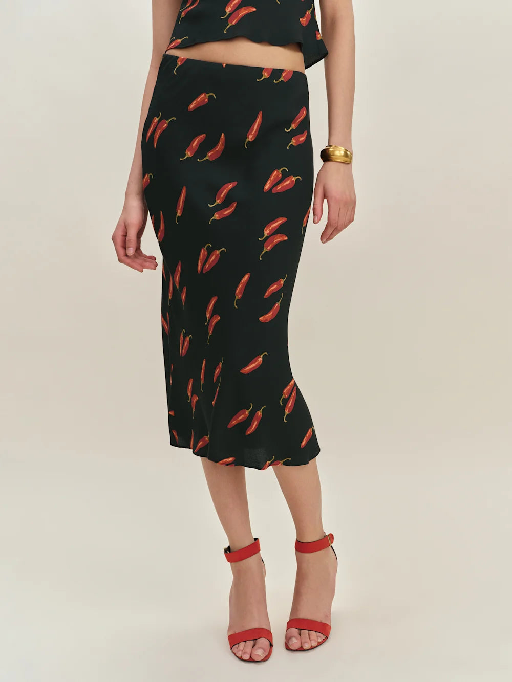 The Ryan Two Piece features a sophisticated v-neck design with a fully lined construction for a polished look. Crafted from lightweight, drapey crepe fabric, it offers a refined dry hand feel that enhances comfort and movement, making it ideal for stylish, effortless wear.