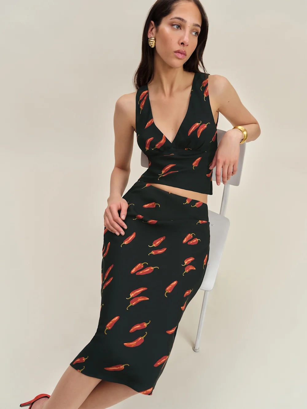 The Ryan Two Piece features a sophisticated v-neck design with a fully lined construction for a polished look. Crafted from lightweight, drapey crepe fabric, it offers a refined dry hand feel that enhances comfort and movement, making it ideal for stylish, effortless wear.