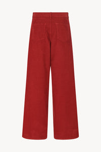 Introducing the Chan Pant, designed by THE ROW. These corduroy pants boast a wide-leg fit for ultimate comfort and style. Step up your wardrobe with these versatile and elegant pants that will elevate any outfit. A must-have for any fashion-forward individual!