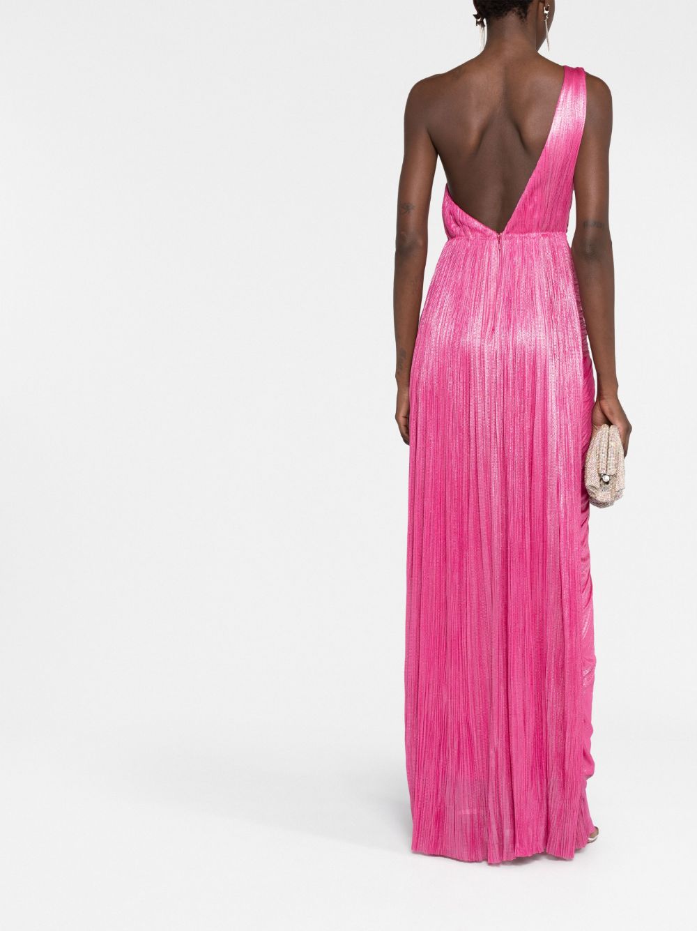 Indulge in luxury and sophistication with Maria Lucia Hohan's Esther One-shoulder Gown. Expertly crafted from lustrous silk, this floor-length gown features a striking metallic raspberry pink hue and a thigh-high slit for a modern touch. With elegant draped detailing, an open back, and a concealed zip fastening, this one-shoulder gown is the perfect addition to your wardrobe collection.