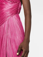 Load image into Gallery viewer, Indulge in luxury and sophistication with Maria Lucia Hohan&#39;s Esther One-shoulder Gown. Expertly crafted from lustrous silk, this floor-length gown features a striking metallic raspberry pink hue and a thigh-high slit for a modern touch. With elegant draped detailing, an open back, and a concealed zip fastening, this one-shoulder gown is the perfect addition to your wardrobe collection.
