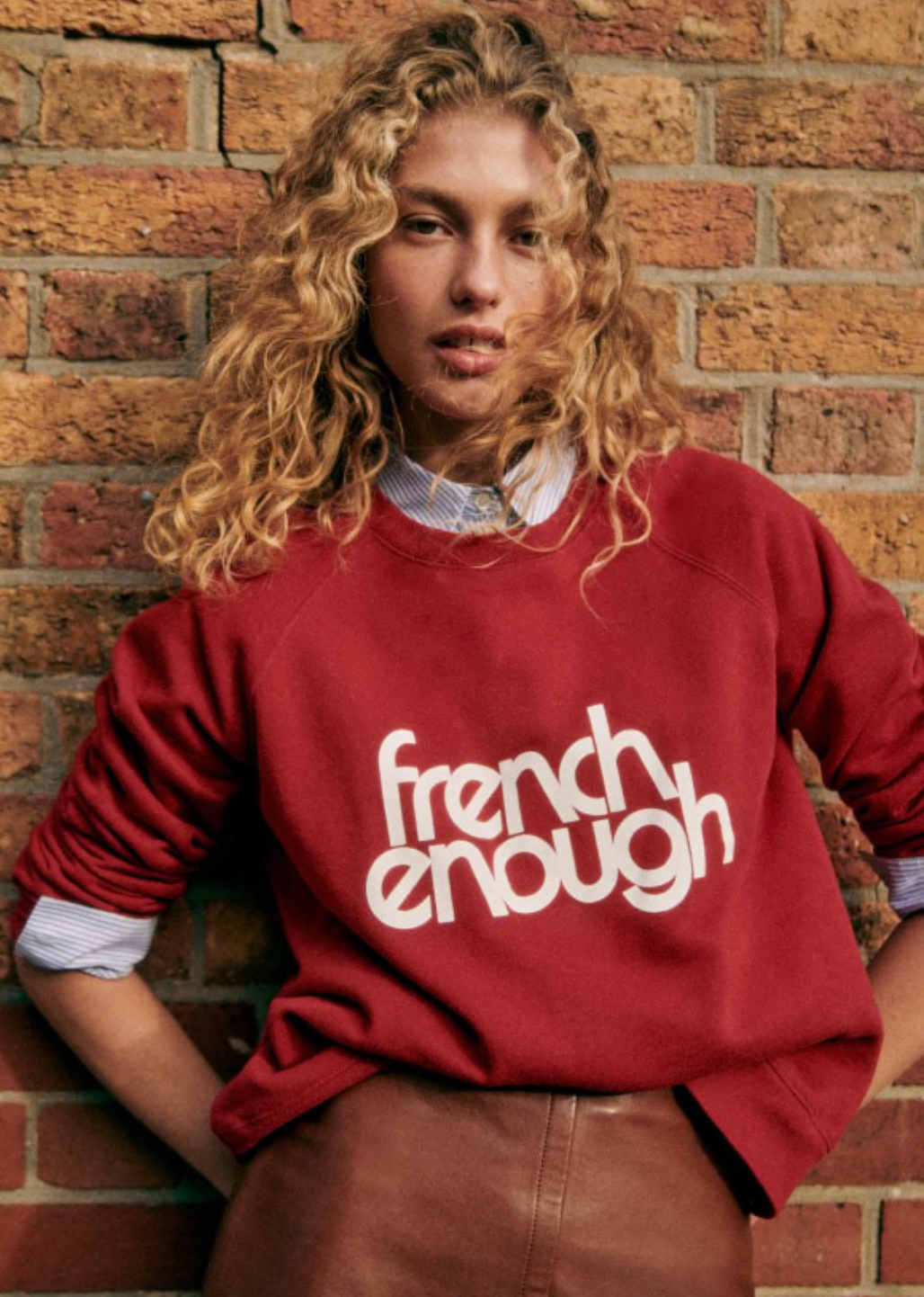 Stay comfy and stylish with this long-sleeved organic cotton sweatshirt. Show off your love for French culture with the "French Enough" print on the front, while staying cozy with the round neckline. Good for you and the environment.