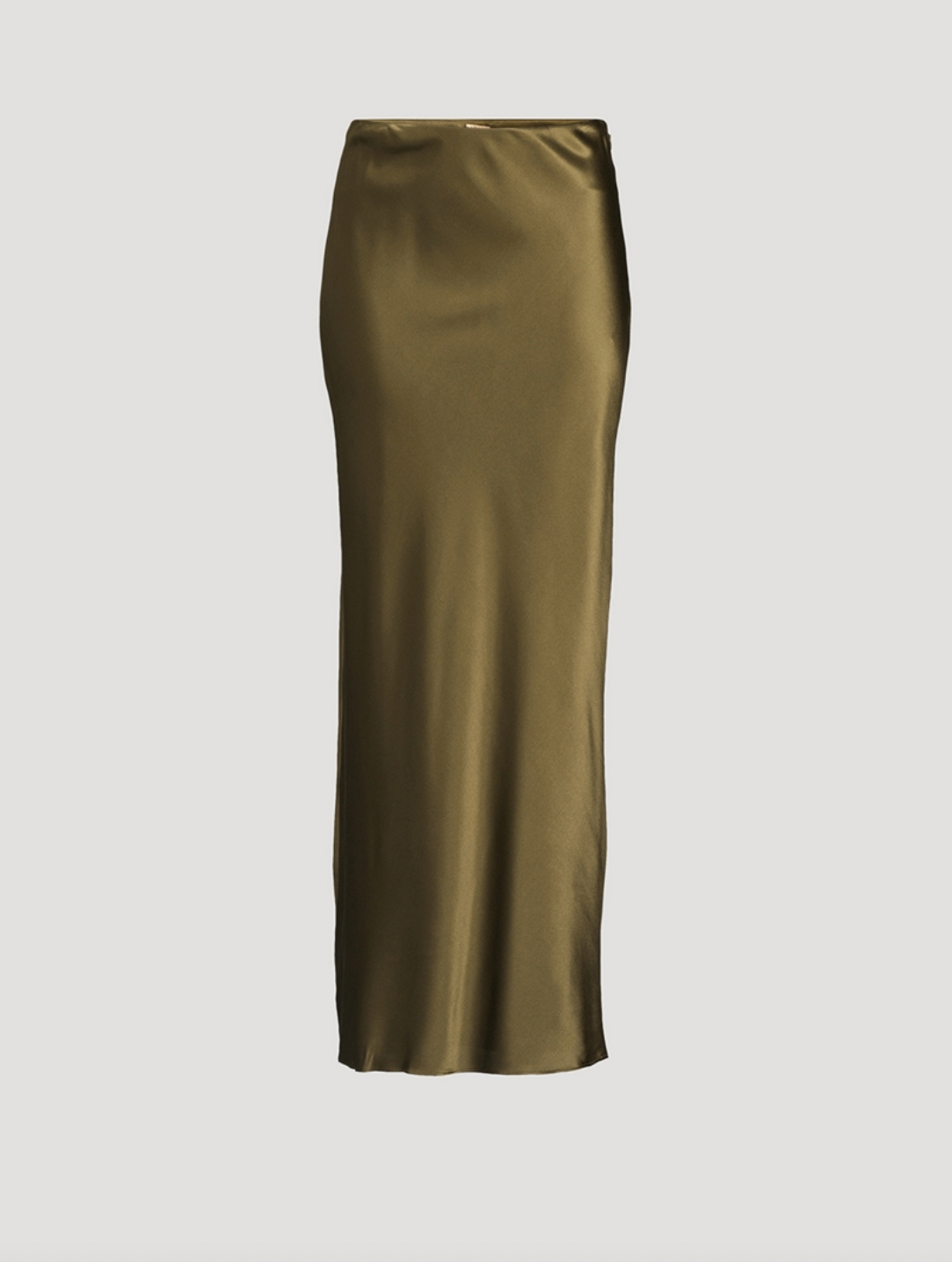 Experience effortless elegance with the Chantel Satin Slip Skirt by Cult Gaia. Cut on the bias for a flattering fit, this maxi-length piece is crafted from glossy silk that gently stretches for comfort. Its smooth, flowing silhouette enhances every movement, making it perfect for both day and evening wear. Elevate your wardrobe with this timeless, luxurious skirt that exudes sophistication and versatility.
