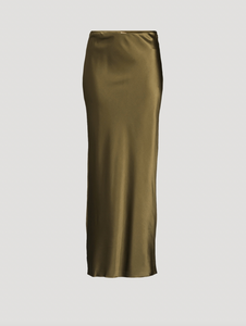 Experience effortless elegance with the Chantel Satin Slip Skirt by Cult Gaia. Cut on the bias for a flattering fit, this maxi-length piece is crafted from glossy silk that gently stretches for comfort. Its smooth, flowing silhouette enhances every movement, making it perfect for both day and evening wear. Elevate your wardrobe with this timeless, luxurious skirt that exudes sophistication and versatility.