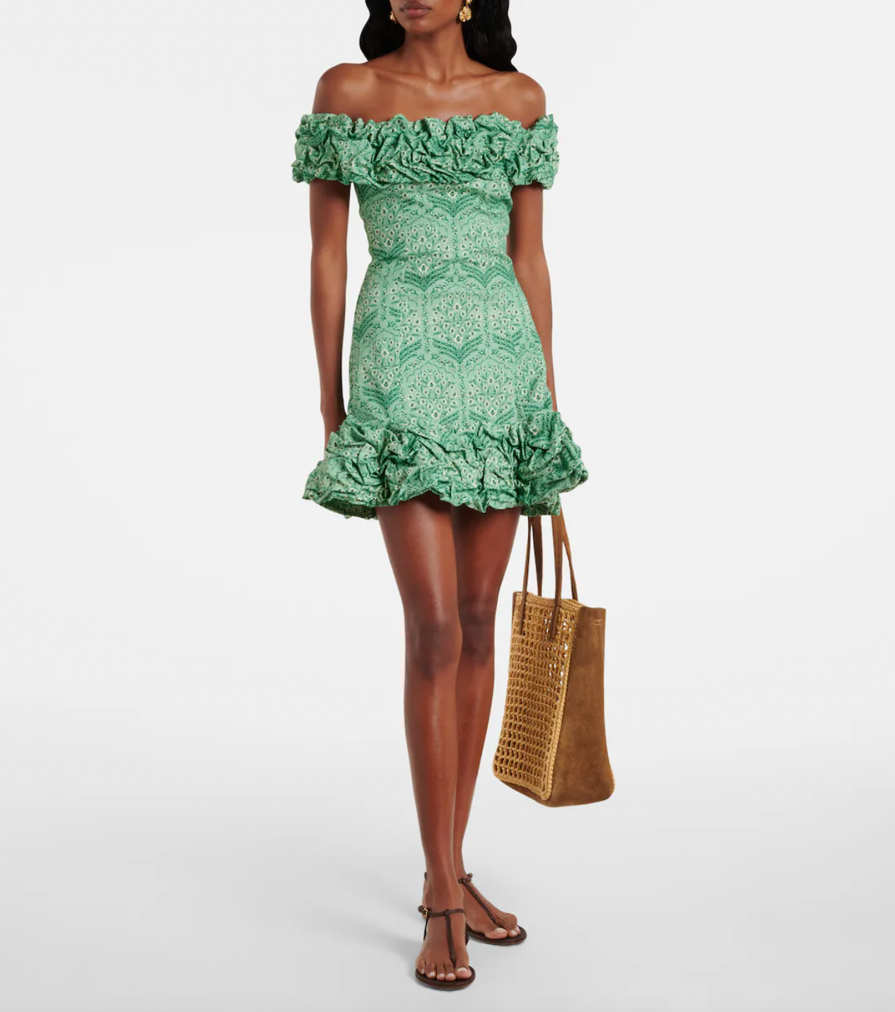 Discover the artistry of Agua by Agua Bendita's Jardín minidress, a stunning piece handcrafted by talented female artisans in Medellín, Colombia. This charming design features a soft cotton-blend poplin fabric with a playful ruffled hem and elegant off-shoulder neckline that flatters every silhouette. Each dress tells a story of skilled craftsmanship and celebrates the vibrant spirit of Colombian artistry. 