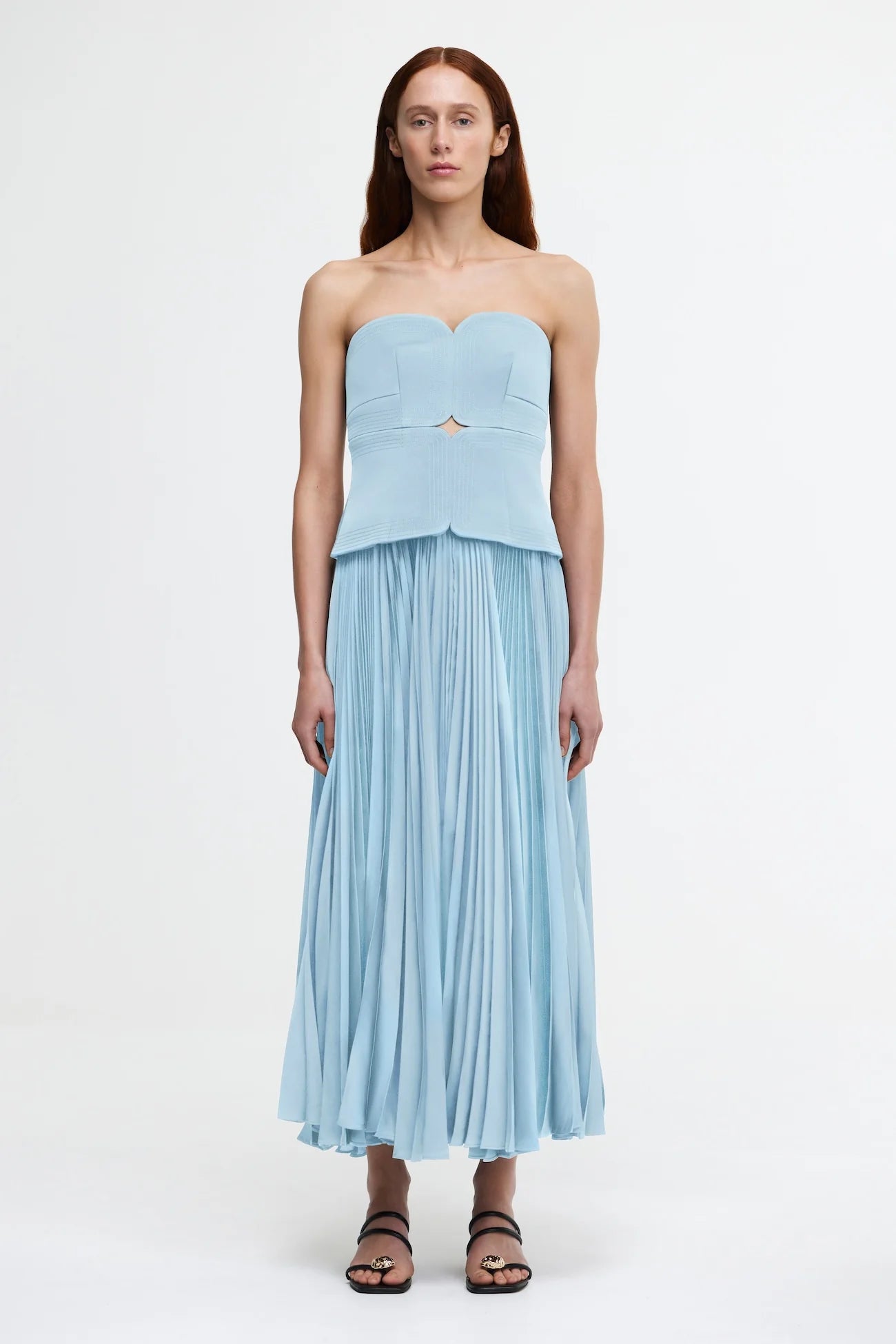 Introducing the Avonlea Dress by ACLER - a modern interpretation of the timeless Acler silhouette. Crafted in Celeste Blue, this midi dress boasts a structured bodice and square neckline, perfectly complementing the signature pleated fabric for a feminine, flowing look. Elevate your style with this exclusive piece.