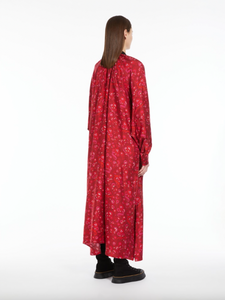 Expertly crafted in luxurious pure silk and adorned with a shimmering embroidered dragon, this midi shirtdress boasts a fluid silhouette with a flared skirt and detachable silk charmeuse belt. It features a lightly gathered mandarin collar, side pockets, and hidden button closure. Elevate your waistline with the matching leather belt.