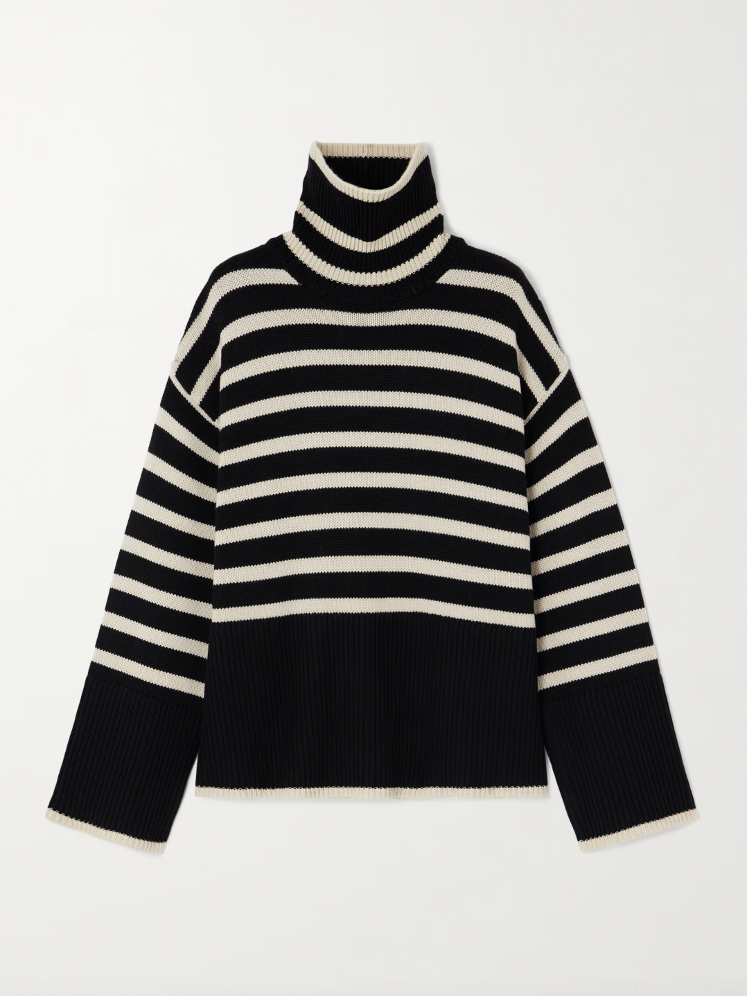 This striped wool-blend turtleneck sweater from TOTEME combines timeless style with cozy comfort. Crafted from a soft blend of wool and organic cotton, it features a relaxed fit and a classic turtleneck, making it perfect for layering. The iconic stripes add a refined touch, while the breathable fabric ensures warmth without bulk. Pair it with tailored pants for an effortlessly polished look that lasts season after season.