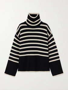 This striped wool-blend turtleneck sweater from TOTEME combines timeless style with cozy comfort. Crafted from a soft blend of wool and organic cotton, it features a relaxed fit and a classic turtleneck, making it perfect for layering. The iconic stripes add a refined touch, while the breathable fabric ensures warmth without bulk. Pair it with tailored pants for an effortlessly polished look that lasts season after season.