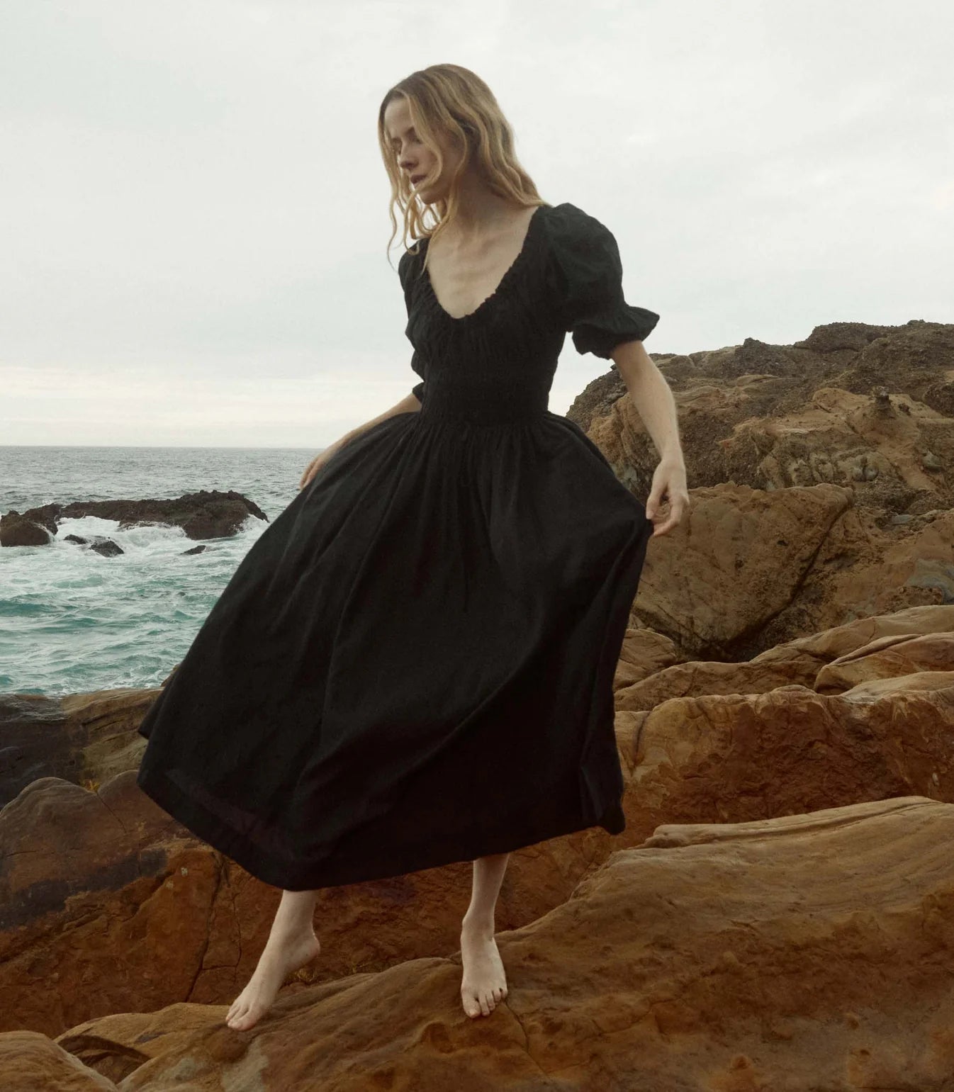 In a soft, lightweight blend of organic cotton and viscose, the Ischia Dress—a Favorite Character that made its debut in Spring 2021 and remains a bestseller—features double-puffed elbow-length sleeves and a scoop neckline accented with a functional center tie. A smocked bodice gives way to a full, ankle-grazing skirt, while a waist tie allows you to adjust the fit. Petite ruffles adorn the sleeve cuffs and neckline.