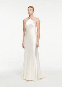 Expertly crafted from luxurious silk satin, this Embellished Gown by Roland Mouret features a stunning open back with lace-up detail and elegant A-Line silhouette. Perfect for any special occasion, this halter gown exudes timeless sophistication and will make you feel confident and beautiful.