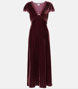 Indulge in luxury with the Clarice Dress, a perfect party-ready midi dress. Crafted from smooth velvet and delicate silk, this dress exudes elegance and softness. With its sophisticated design, you'll be the center of attention at any event.