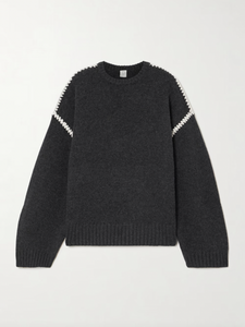 Elevate your wardrobe with this oversized sweater by Toteme crafted from a sumptuous wool and cashmere blend. Its relaxed fit with dropped shoulders offers effortless comfort, while the contrasting cream embroidery adds a refined, distinctive touch. Designed as a timeless staple, it seamlessly enriches your collection, providing both warmth and style for any occasion.