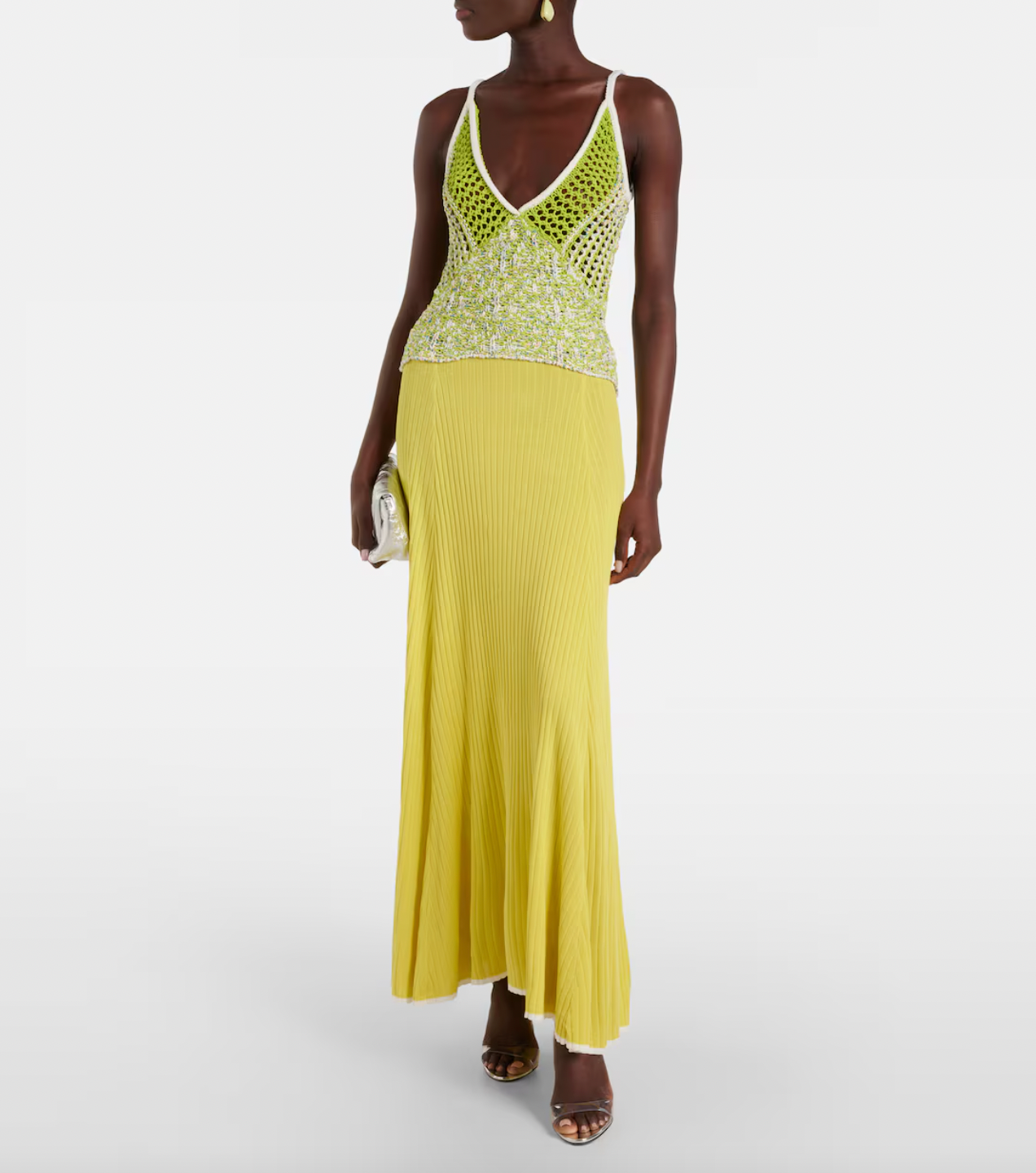 This Lace-trimmed slip dress by Christopher Esber boasts a stunning V-neck collar and delicate sleeveless design. With beautiful crochet panelling, this elegant piece is perfect for any formal occasion. Made from high-quality fabrics, it offers both style and comfort, making you the center of attention.