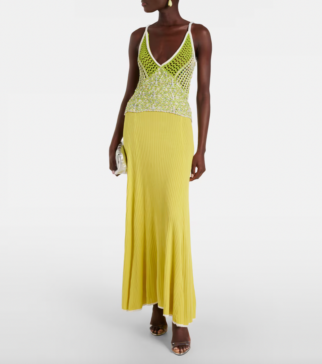 This Lace-trimmed slip dress by Christopher Esber boasts a stunning V-neck collar and delicate sleeveless design. With beautiful crochet panelling, this elegant piece is perfect for any formal occasion. Made from high-quality fabrics, it offers both style and comfort, making you the center of attention.