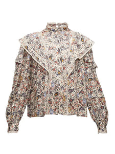 Step into the free-spirited 70s with the Reign Ruffled Paisley-Print Blouse! Adopted by icons like Janis Joplin and Jimi Hendrix, this Isabel Marant Étoile blouse exudes bohemian charm with its multicoloured paisley pattern. Lightweight poplin and delicate lace-trimmed ruffles add a feminine touch. Pair with tailored trousers for a stylish contrast.