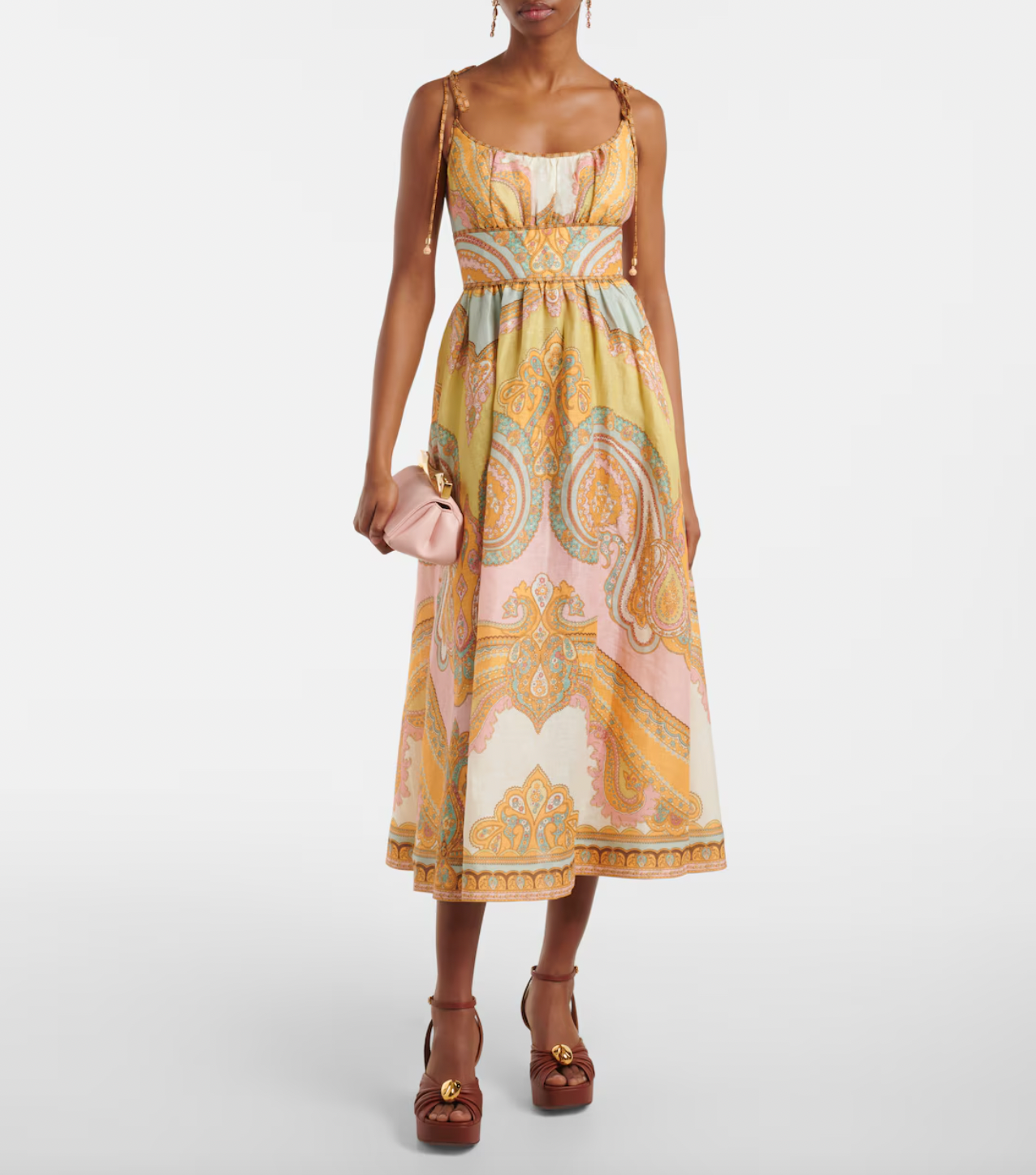 Elevate your wardrobe with the Maxine Picnic paisley linen bustier dress from Zimmermann. This midi-length dress showcases a timeless paisley placement print on breathable linen, highlighting a fitted bustier with delicate gathering and flat piping for a flattering silhouette. Self-tie straps offer adjustable comfort, while side seam pockets add practical charm. Perfect for warm days and stylish gatherings, this dress effortlessly combines elegance and ease.