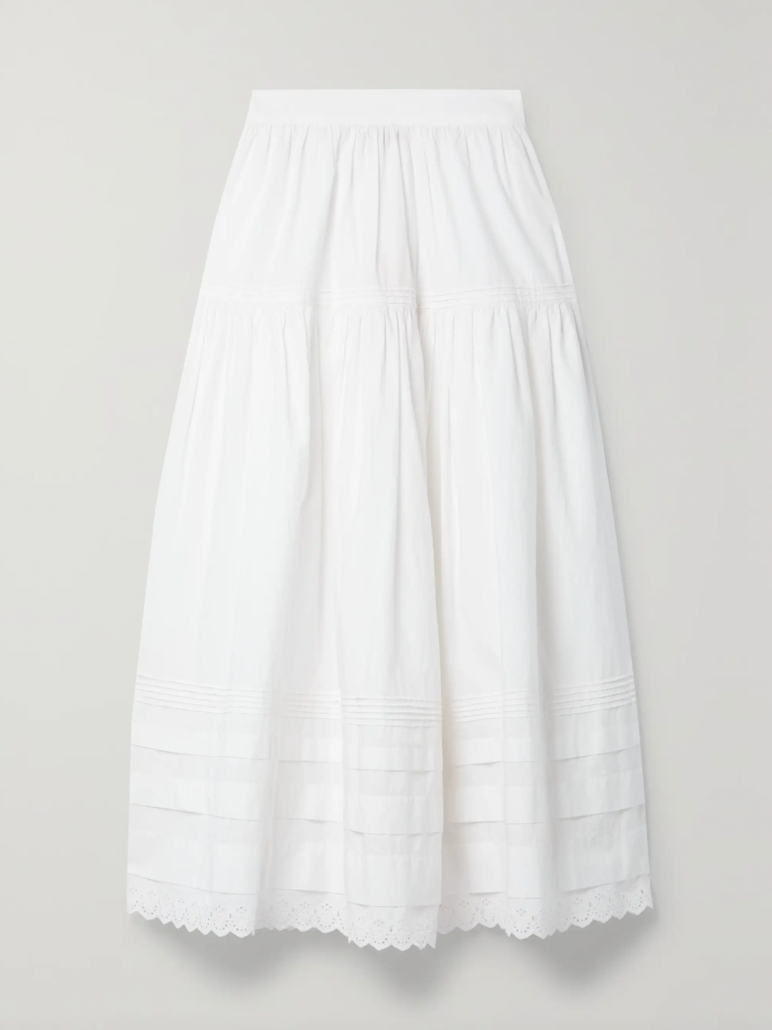 Inspired by Edwardian bridal tradition, this Sebastiane skirt combines timeless elegance with modern sustainability. Crafted from organic cotton-poplin, its tiered silhouette features delicate pintucks and elegant broderie anglaise trim, adding a touch of vintage charm to your wardrobe. Perfect for those who appreciate refined detail and eco-conscious fashion.