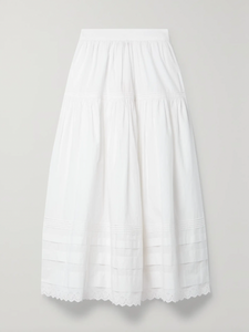 Inspired by Edwardian bridal tradition, this Sebastiane skirt combines timeless elegance with modern sustainability. Crafted from organic cotton-poplin, its tiered silhouette features delicate pintucks and elegant broderie anglaise trim, adding a touch of vintage charm to your wardrobe. Perfect for those who appreciate refined detail and eco-conscious fashion.