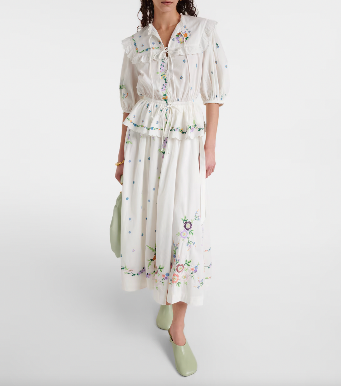 Effortlessly elevate your wardrobe with the Willa Embroidered Set. The tie front top with self-covered eyelet buttons and frill yoke detail add a touch of femininity, while the embroidered motif detail adds a unique touch. The elasticated drawstring waist and balloon sleeves provide a comfortable fit, making this set a must-have for any occasion.