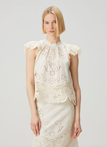 Elevate your wardrobe with the Gianna Bone Lace Blouse by SEA, featuring a refined mandarin collar that adds subtle sophistication. Delicate lace and ruffle details enhance its tank top design, blending elegance with breathable comfort. Ideal for layering or wearing alone, this blouse offers a polished look perfect for both professional settings and stylish casual occasions.