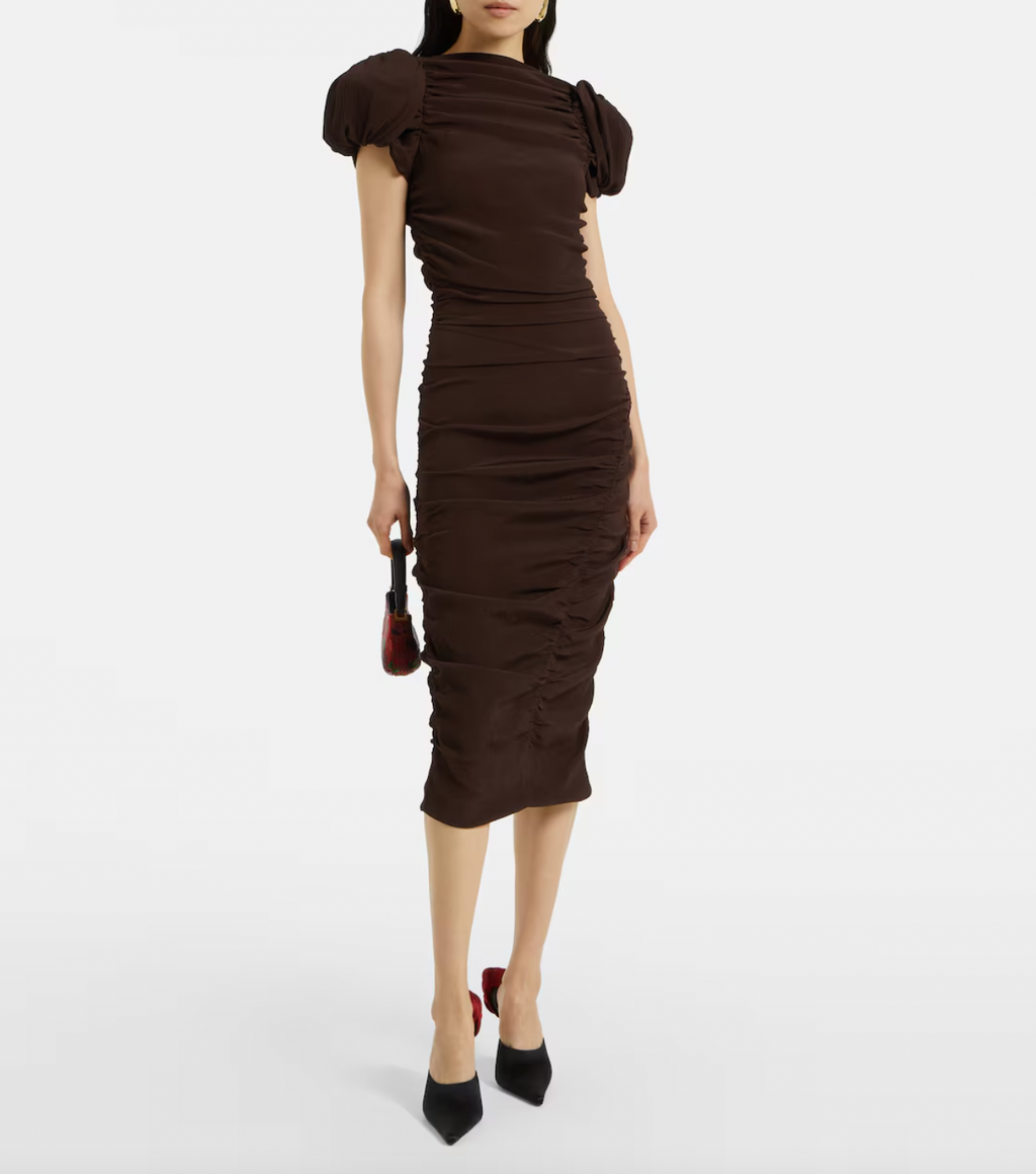Elevate your wardrobe with this expert-crafted puff-sleeve silk midi dress by Magda Butrym. Designed with voluminous sleeves and a fluid silhouette, it combines luxurious silk fabric with sophisticated tailoring to create a timeless piece. Perfect for formal events or refined everyday elegance, the dress offers both comfort and statement style, reflecting meticulous attention to detail and high-quality craftsmanship.