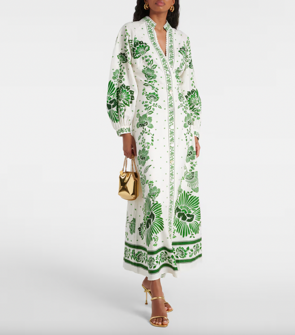 Indulge in elegance with the FARM RIO Forest Soul Maxi Dress. Crafted from a luxurious linen-blend, this printed dress exudes sophistication and exclusivity. Channel your inner artistry and fashion-forward style in this must-have statement piece.