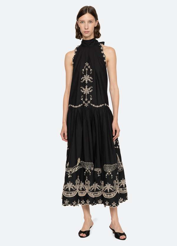 Elevate your wardrobe with the Kingsley Embroidery Tank Dress by SEA NY, designed to combine elegance and ease. Featuring intricate embroidered details, a high neckline, and a charming back bow tie, this dress offers a sophisticated silhouette. The scalloped hemline adds a delicate finishing touch, while the button back closure ensures a relaxed and comfortable fit. Perfect for any occasion, Kingsley blends timeless style with effortless charm.