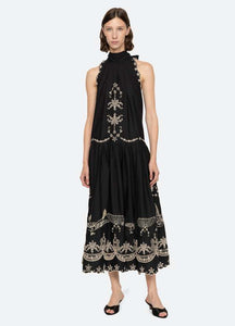Elevate your wardrobe with the Kingsley Embroidery Tank Dress by SEA NY, designed to combine elegance and ease. Featuring intricate embroidered details, a high neckline, and a charming back bow tie, this dress offers a sophisticated silhouette. The scalloped hemline adds a delicate finishing touch, while the button back closure ensures a relaxed and comfortable fit. Perfect for any occasion, Kingsley blends timeless style with effortless charm.