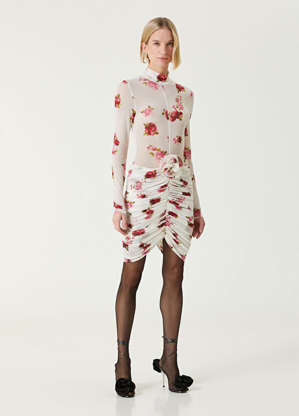 Elevate your wardrobe with the Printed Jersey Mini Dress by Magda Butrym, featuring delicate rose appliqués that add a touch of romance. Crafted from soft, comfortable jersey fabric, this dress offers a flattering fit enhanced by elegant draped panels at the hem. Its unique all-over print ensures no two pieces are exactly alike, letting you stand out with effortless sophistication. Perfect for daytime events or chic evenings, this mini dress combines style and comfort seamlessly.