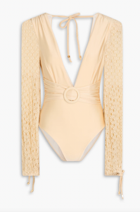 Elevate your beach look with the PatBO Belted Crochet-trimmed Swimsuit. This exquisite piece boasts intricate crochet accents and a waist-cinching belt for a flawless silhouette. Channel your inner goddess and radiate confidence and style while basking in the sun.