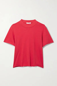 The Fedrino Organic Cotton-jersey T-shirt by The Row offers timeless comfort with a soft, breathable fabric perfect for everyday wear. Its relaxed fit and dropped shoulders provide effortless style, while the slightly wider crewneck adds a modern touch. The subtle back seam enhances the streamlined look, making this tee a versatile staple you’ll turn to season after season. Available in a variety of colors to suit your personal style.