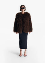 Load image into Gallery viewer, Experience the ultimate in luxury with the Brown Mongolian Coat from Desavary. Made from high-quality Mongolian sheepskin, this statement coat is the must-have item of the season. Be the envy of all with this exclusive and elegant piece that will elevate any outfit.
