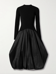 The Kenlie Ribbed-Knit and Taffeta Midi Dress by Simkhai combines a sleek, fitted bodice with a voluminous taffeta skirt that maintains its fullness thanks to soft pleats and a charming bubble hem. This elegant design offers a flattering silhouette that stays graceful whether you’re standing or sitting. Perfect for special occasions, pair it with pumps and understated jewelry to complete a sophisticated and captivating look.