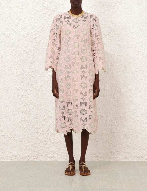 Introducing the Ottie Lace Midi Dress - the perfect blend of elegance and charm. This stunning dress features delicate lace and long sleeves, creating a timeless and sophisticated look. With an invisible zip at the centre back and a separate slip included, comfort and style go hand in hand. Elevate your wardrobe with this must-have piece.