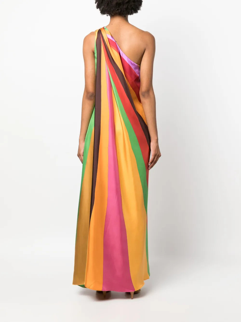 Step into Studio 54 glamour with La DoubleJ's Roy one-shoulder silk maxi dress. This Italian-crafted masterpiece features a dramatic single-shoulder silhouette adorned with hand-placed, kaleidoscopic rainbow stripes that command attention. Crafted from luxurious silk twill, the dress flows effortlessly to the ankle with a sleek straight hem and practical side pockets. 