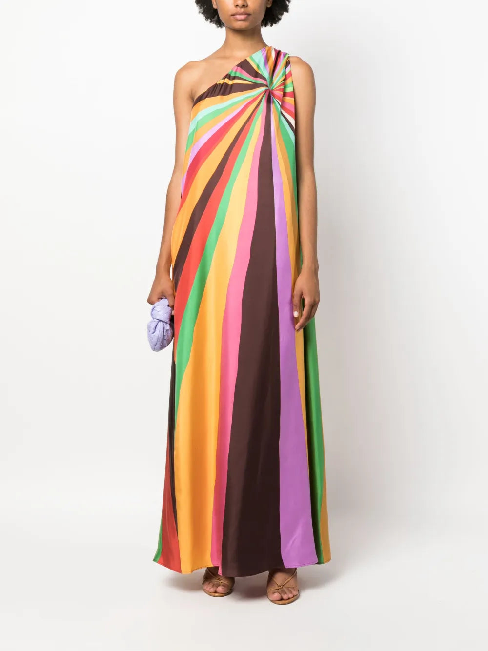 Step into Studio 54 glamour with La DoubleJ's Roy one-shoulder silk maxi dress. This Italian-crafted masterpiece features a dramatic single-shoulder silhouette adorned with hand-placed, kaleidoscopic rainbow stripes that command attention. Crafted from luxurious silk twill, the dress flows effortlessly to the ankle with a sleek straight hem and practical side pockets. 