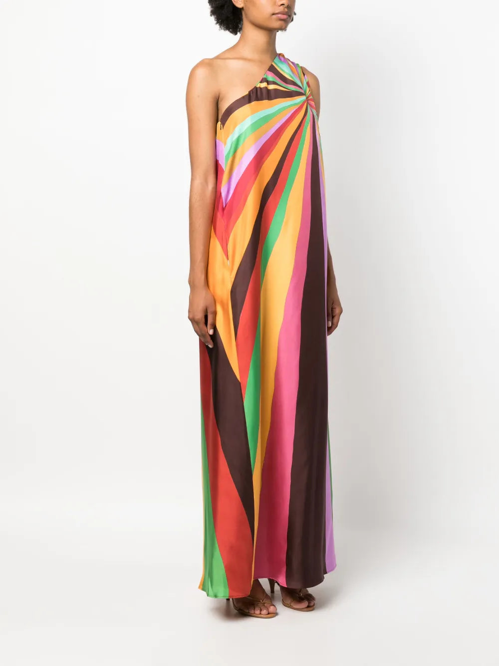 Step into Studio 54 glamour with La DoubleJ's Roy one-shoulder silk maxi dress. This Italian-crafted masterpiece features a dramatic single-shoulder silhouette adorned with hand-placed, kaleidoscopic rainbow stripes that command attention. Crafted from luxurious silk twill, the dress flows effortlessly to the ankle with a sleek straight hem and practical side pockets. 