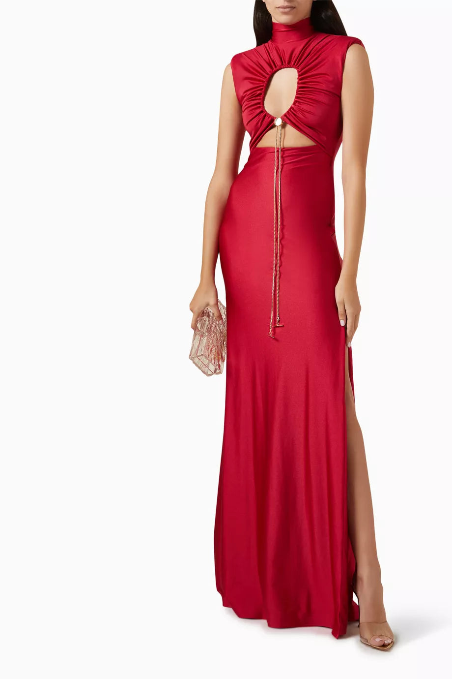The Genis Cut-out Maxi Dress by Daname redefines evening elegance with its striking high neckline and sleeveless silhouette that flatters the modern woman. A daring front cut-out, adorned with a luxe gold-tone toggle chain, creates an eye-catching focal point that sets this piece apart from traditional formal wear. The graceful flared hem adds movement and dimension, making it perfect for those who want to make a sophisticated statement. 