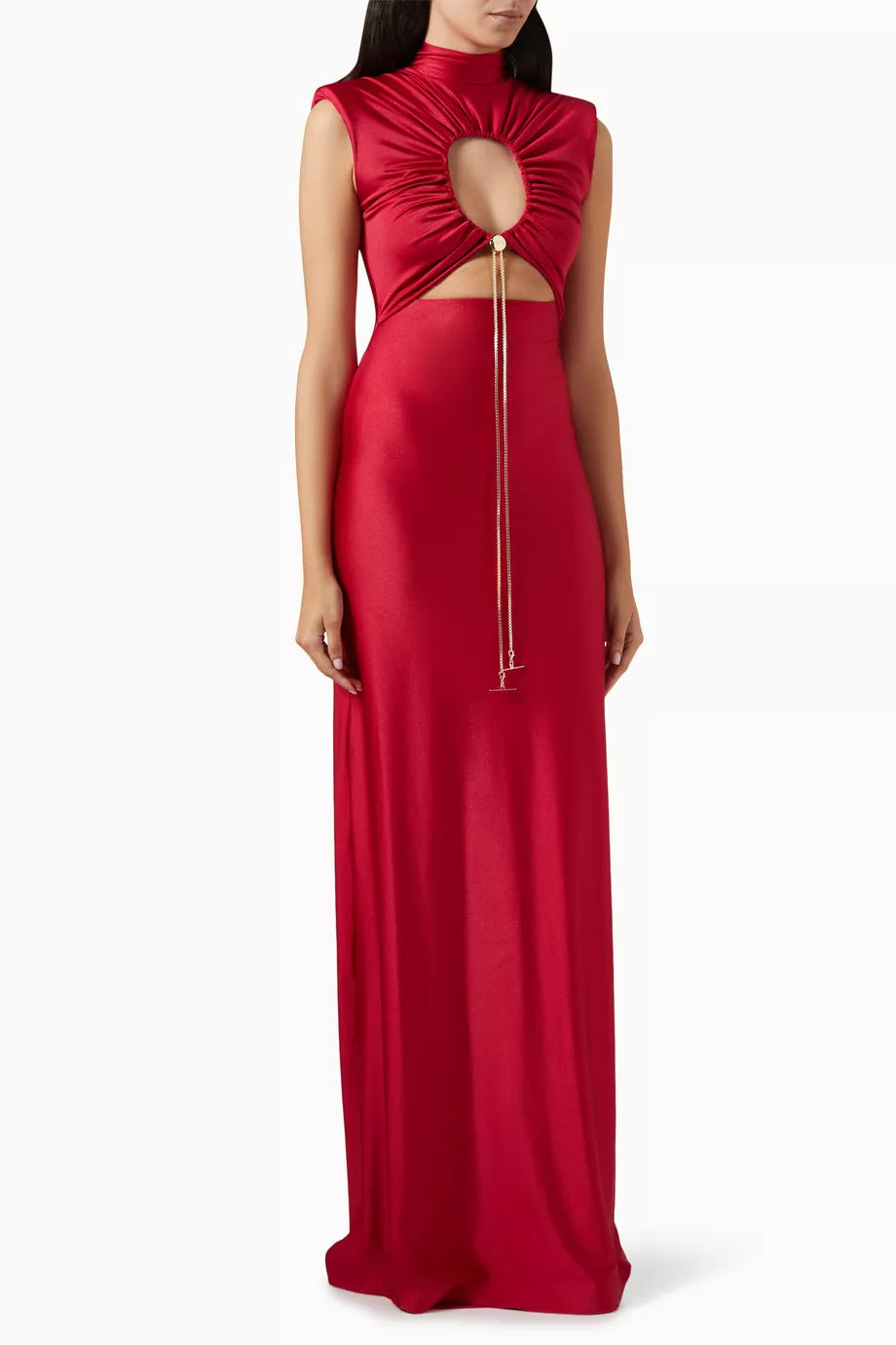 The Genis Cut-out Maxi Dress by Daname redefines evening elegance with its striking high neckline and sleeveless silhouette that flatters the modern woman. A daring front cut-out, adorned with a luxe gold-tone toggle chain, creates an eye-catching focal point that sets this piece apart from traditional formal wear. The graceful flared hem adds movement and dimension, making it perfect for those who want to make a sophisticated statement. 