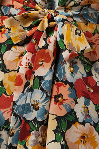 DÔEN’s Dianne Floral Mini Dress in Silk Blend offers effortless elegance for brunches and garden parties. Made from a luxurious silk blend, it drapes gracefully to flatter your silhouette. The adjustable tie-up waist allows for a customized fit, enhancing your figure with subtle definition. Pair it with flats for daytime ease or elevate your look with kitten heels for special events. This versatile dress combines refined comfort with timeless style.