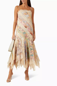 Impress at any elegant event with Zimmermann's Eden Spliced Slip Dress. Made from a luxurious cotton blend, this dress boasts adjustable shoulder straps and a flared hanky hem perfect for twirling on the dance floor. Seen on the FW 2024 runway, it will surely turn heads when paired with heeled sandals.