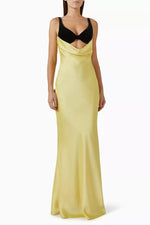 Load image into Gallery viewer, Upgrade your evening wear with Rasario&#39;s luxurious draped maxi dress. The silk velvet bodice showcases your décolletage and collarbone, while the crepe satin skirt accentuates your curves. Make an elegant statement with this refined piece, paired with heels and a chic clutch.
