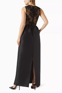The Lace Maxi Dress in Taffeta by Self-Portrait embodies classic sophistication, blending structured taffeta with intricate lace accents. This elegant design offers a refined silhouette ideal for formal events. Enhance your look with statement earrings and sleek heels to complete a polished evening outfit.